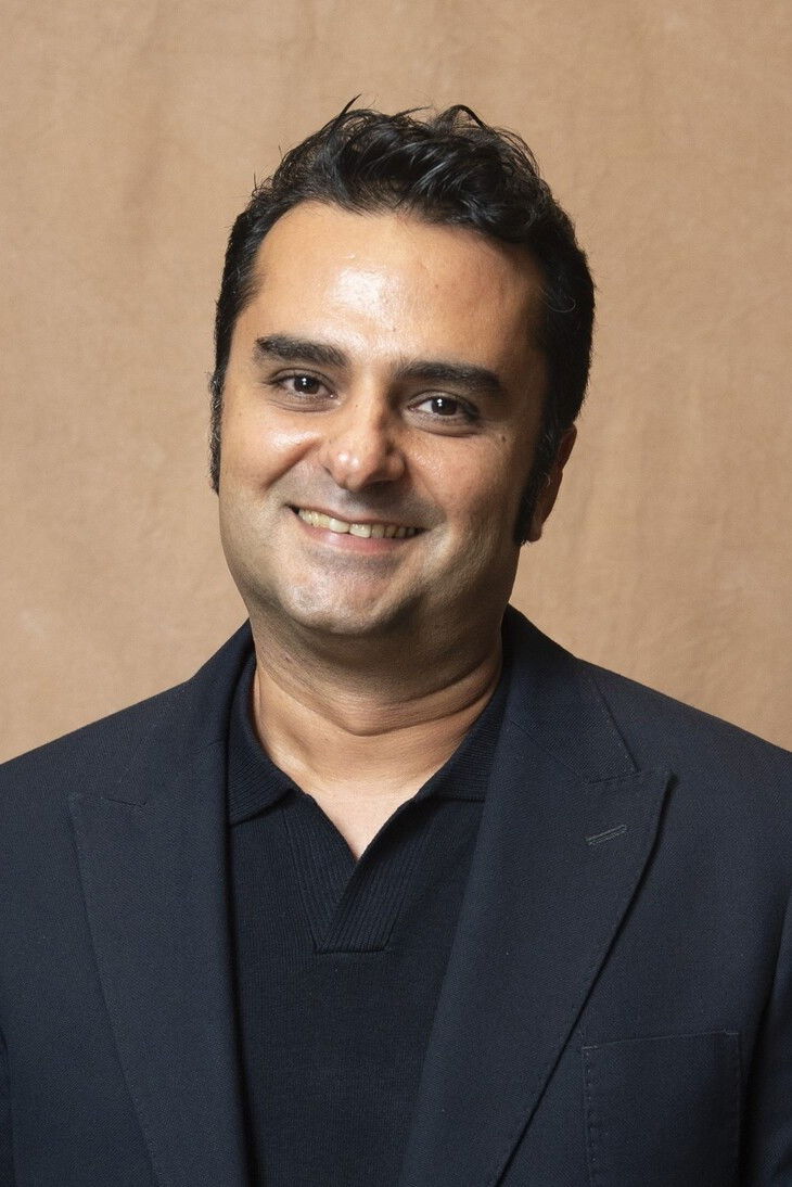 Milad Tangshir backdrop