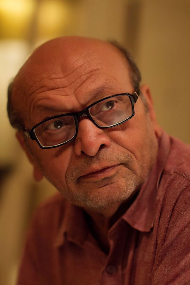 Asghar Wajahat backdrop