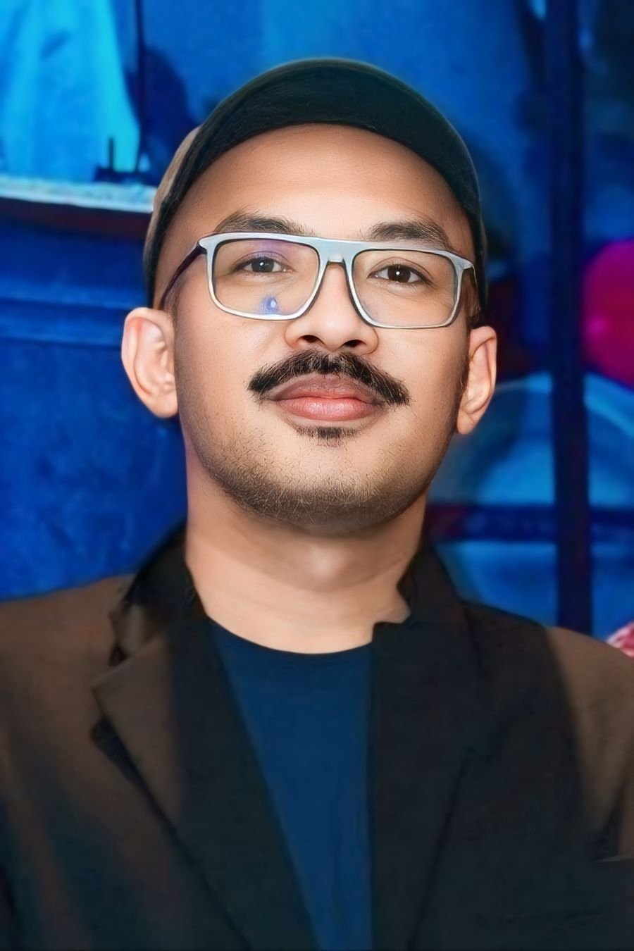 M. N. Qomaruddin backdrop