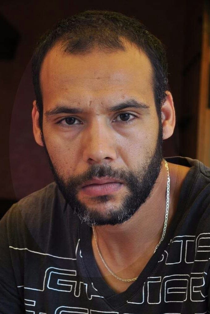 Tarik Rmili backdrop