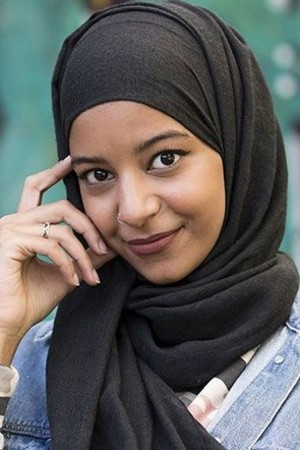 Hajar Brown backdrop