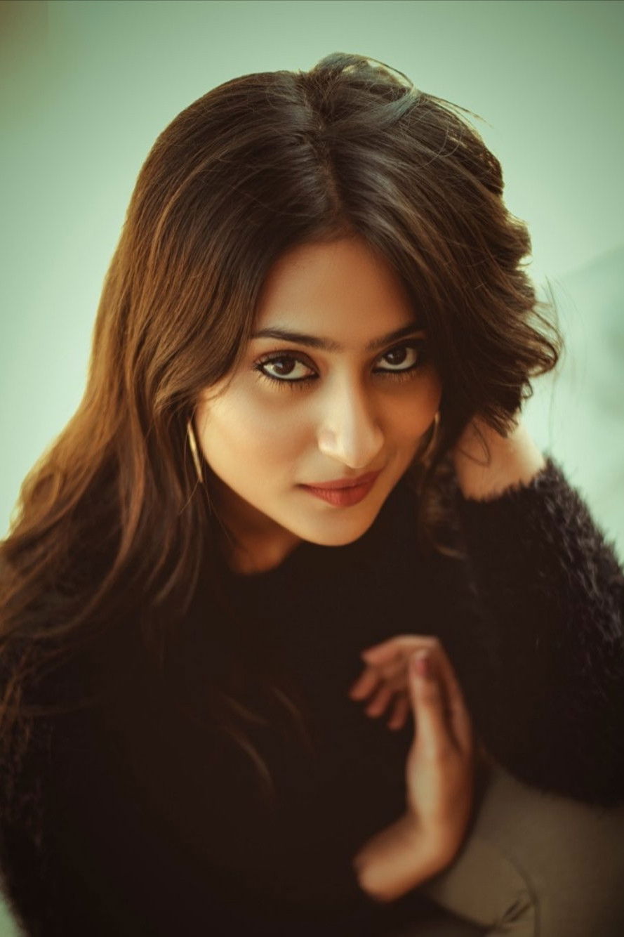 Amrutha Iyengar backdrop