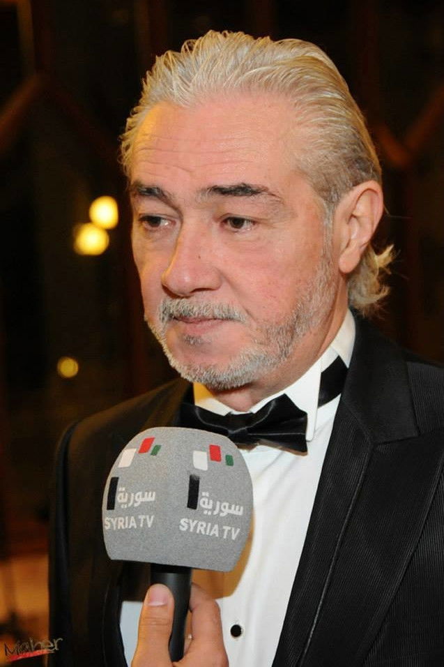 Najdat Anzour backdrop