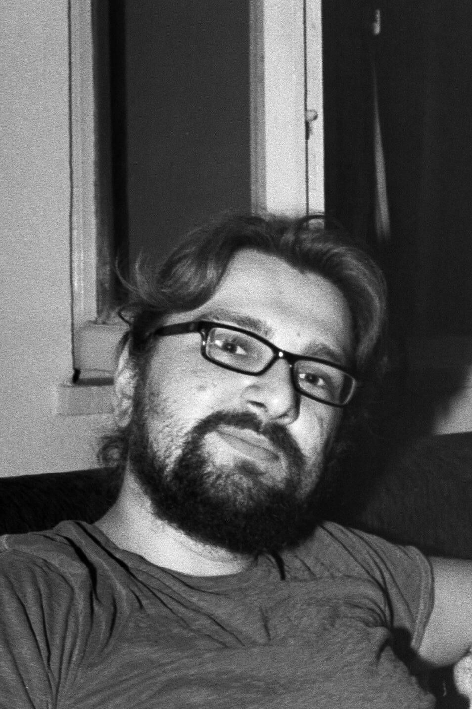 Tolga Doğan backdrop