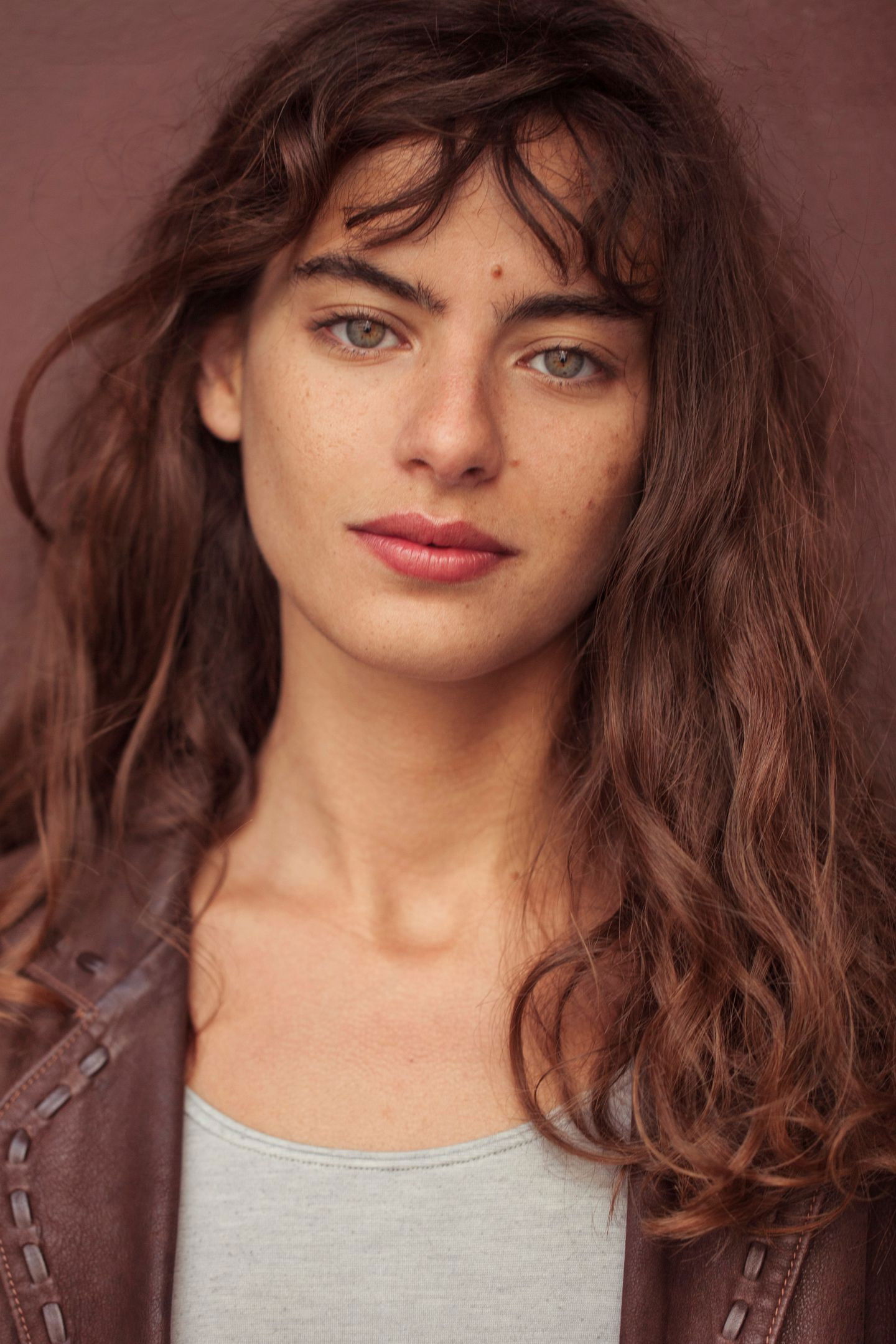 Nina Aboutajedyne backdrop