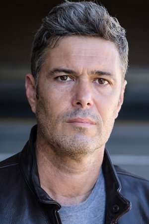 Carlos Bernard backdrop