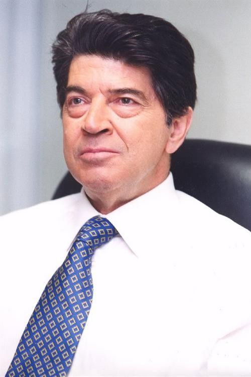 Mimis Hrysomallis backdrop