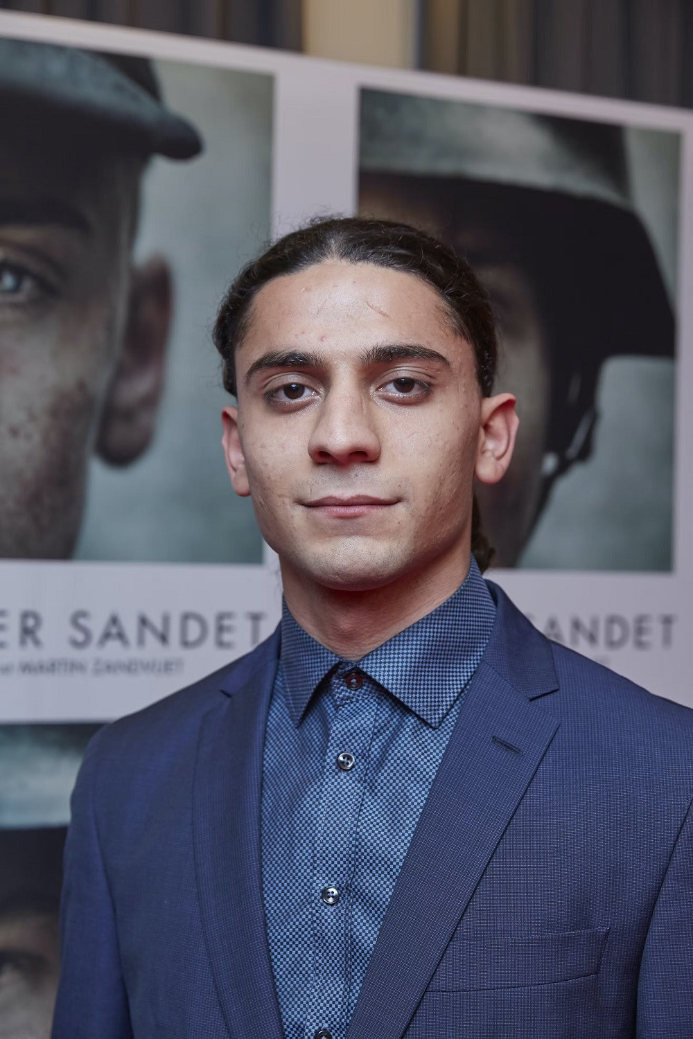 Hassan Yahya backdrop