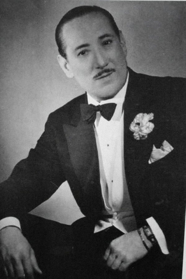 Juan Carlos Cobián backdrop