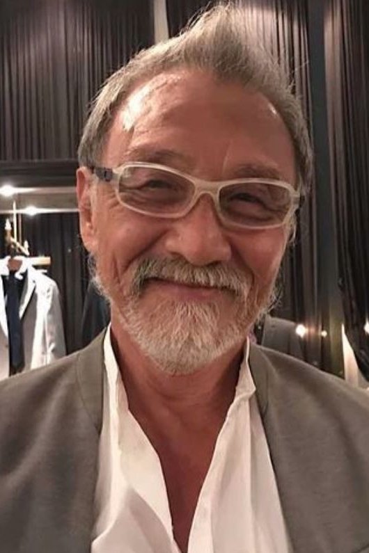 Dean Shek Tin backdrop