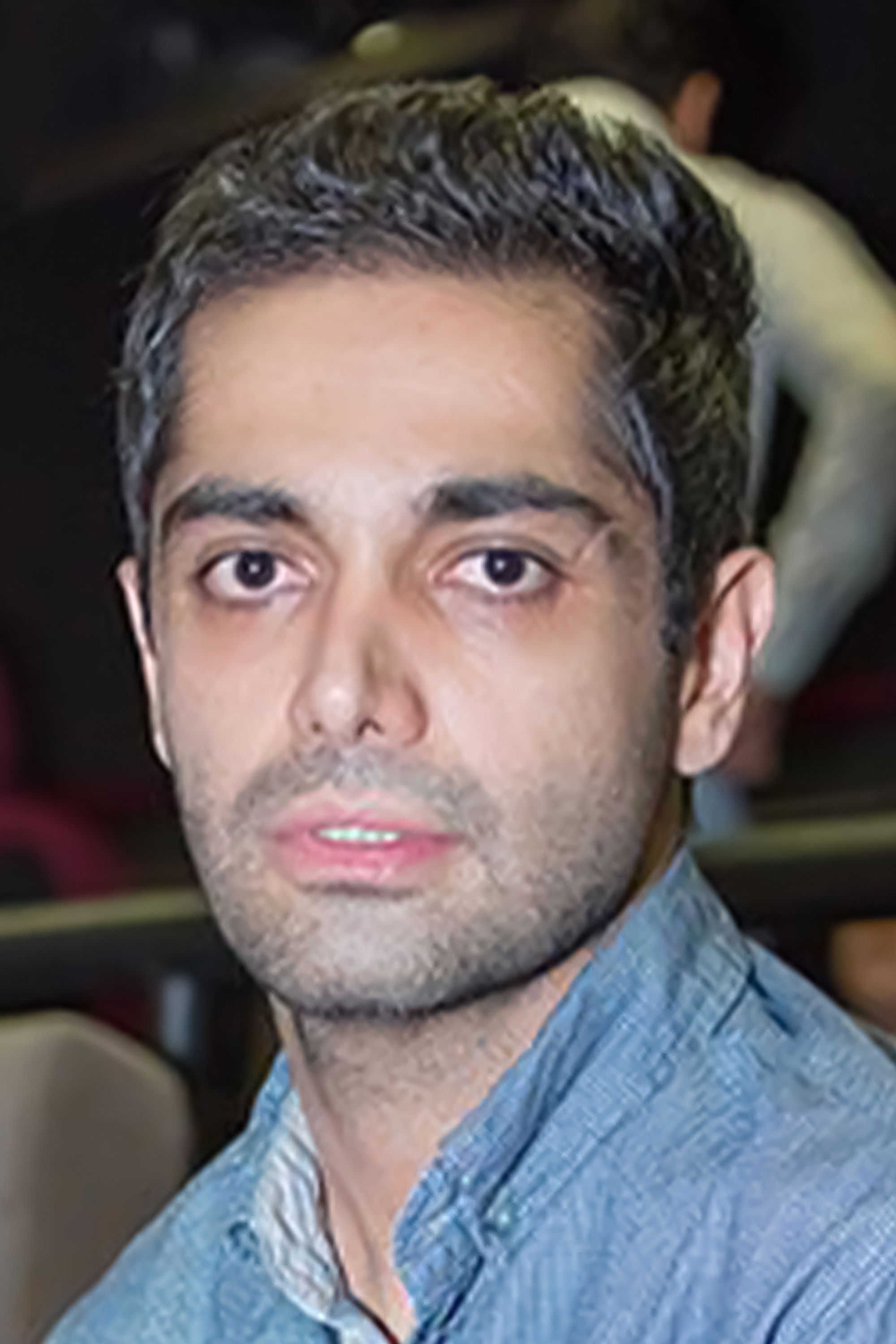 Ashkan Eshtiyagh backdrop