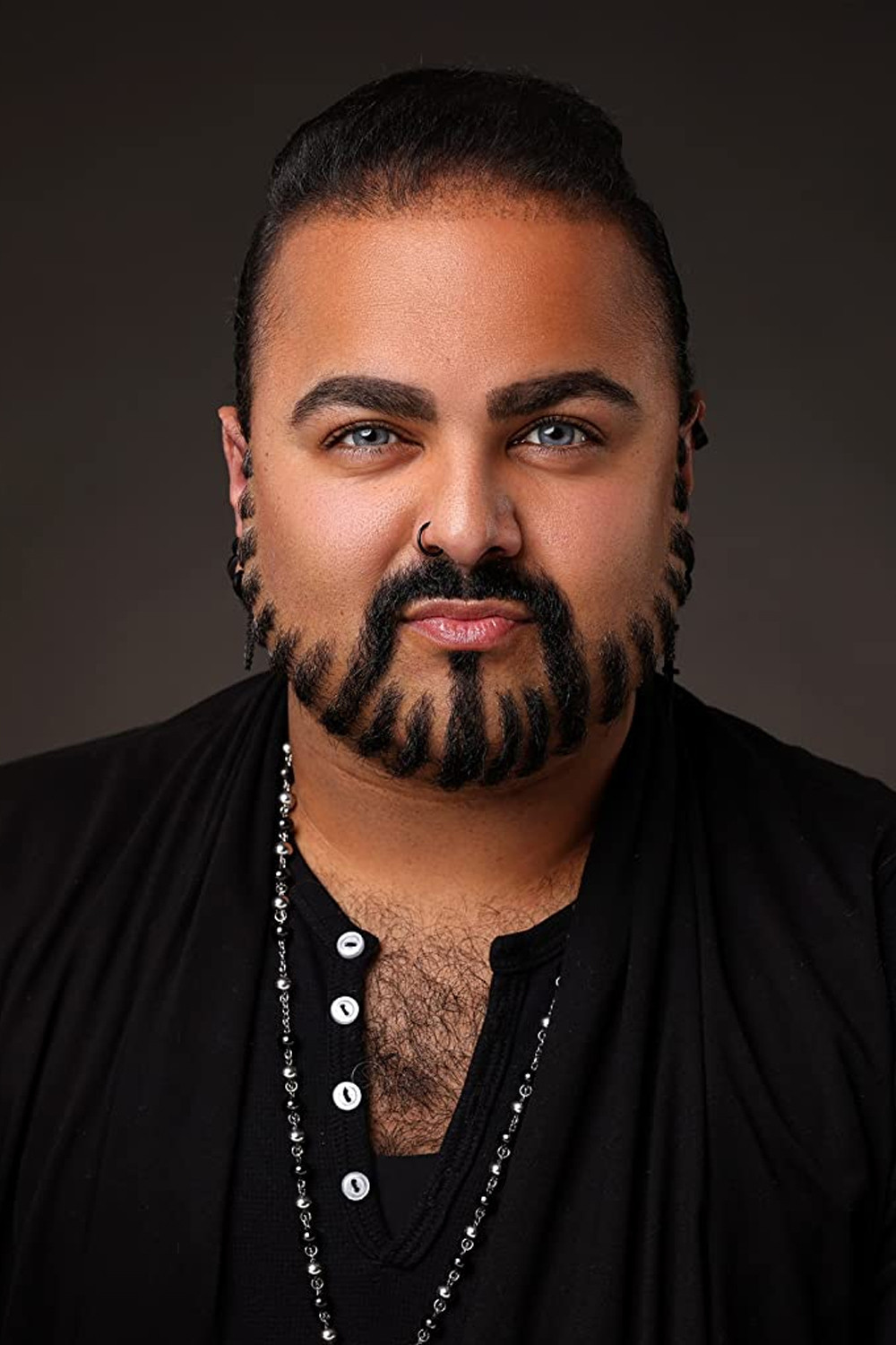 S-Raj Kumar backdrop