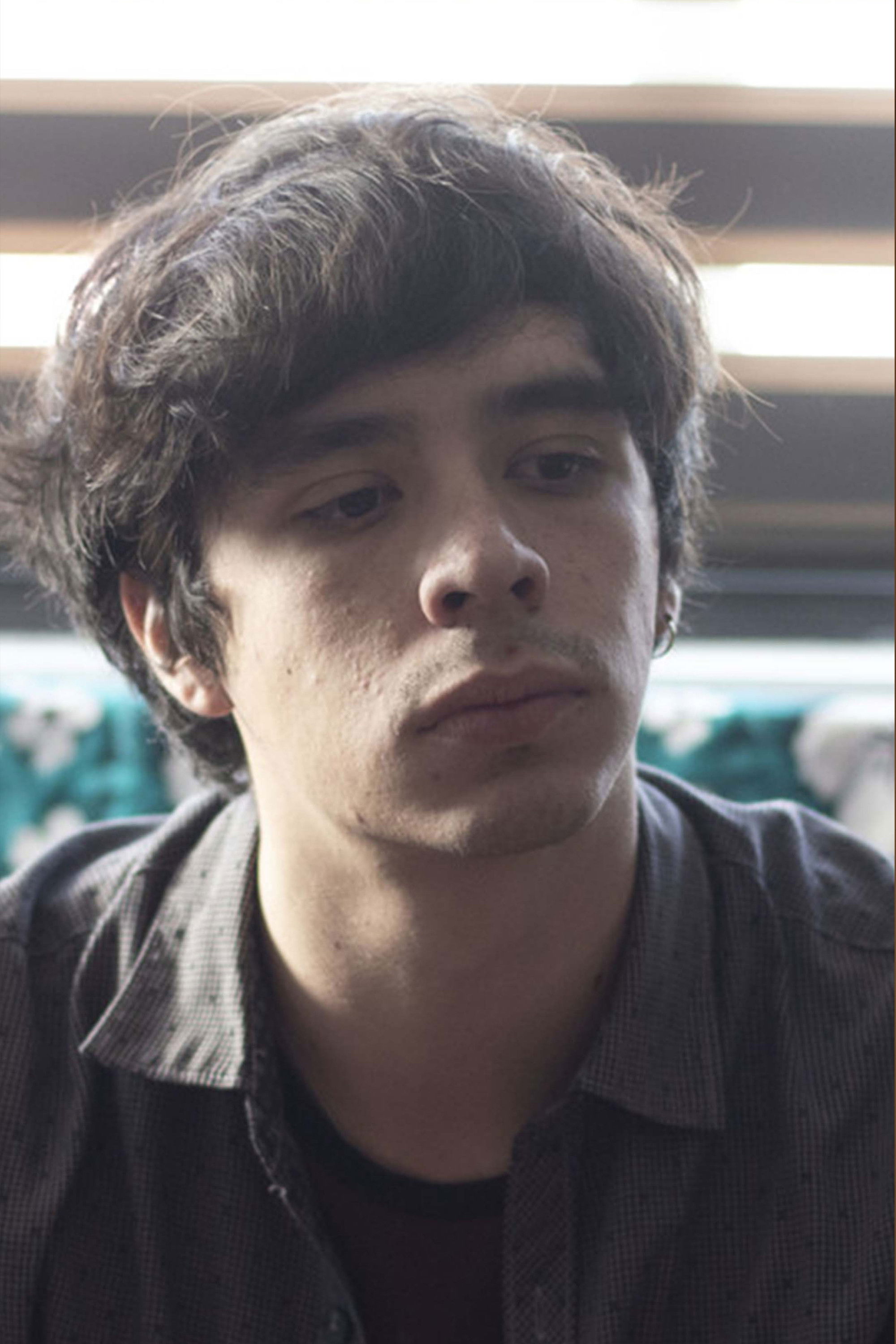 Mauricio Alemán backdrop