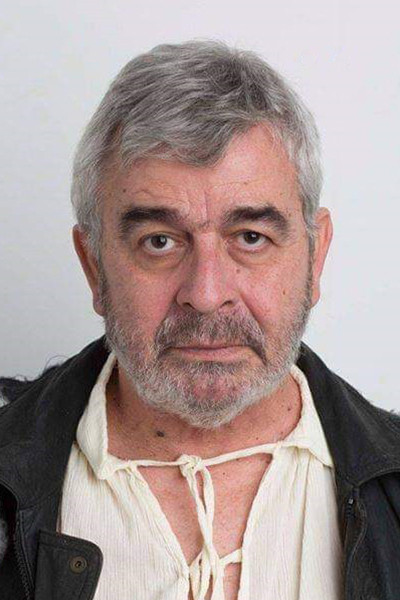 Manolis Michailidis backdrop