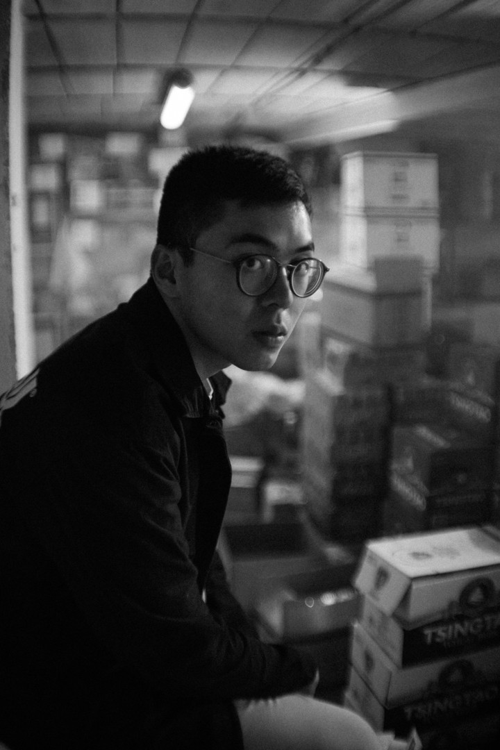 Xin Alessandro Zheng backdrop