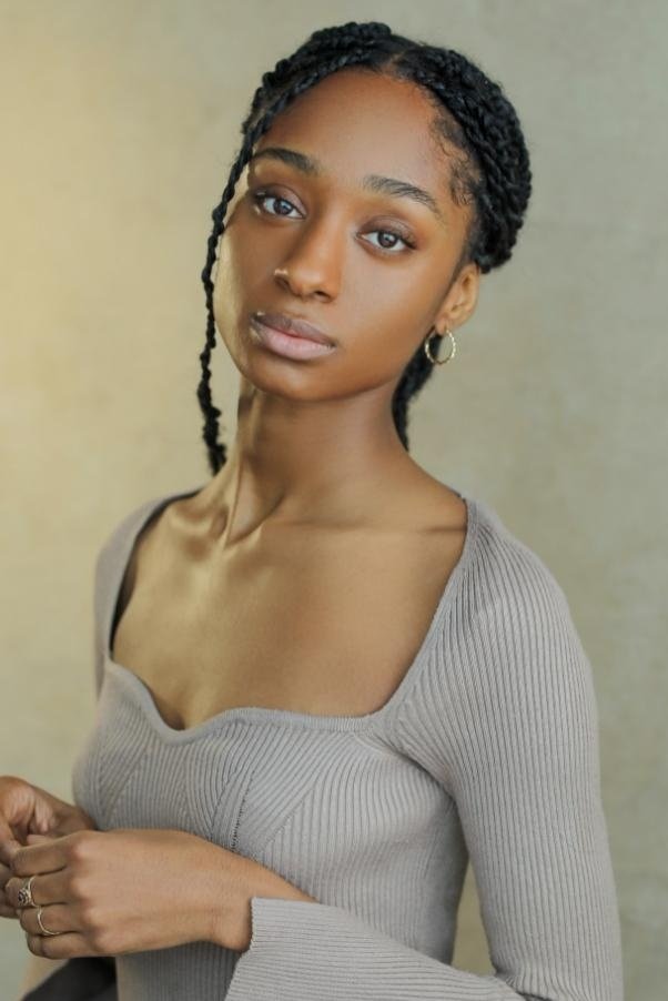 Shanay Neusum-James backdrop