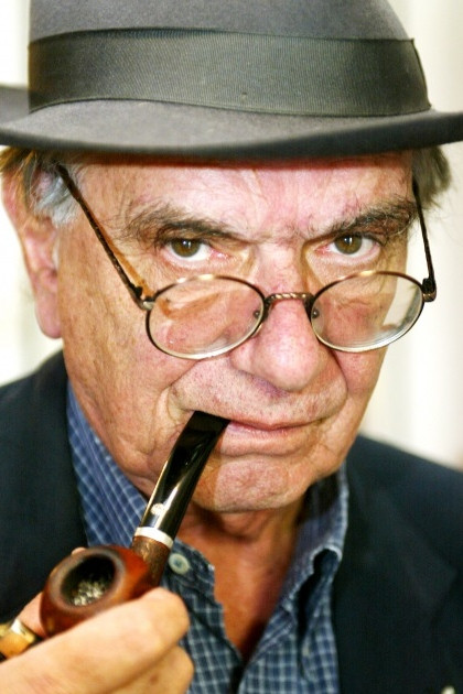 Vasilis Vasilikos backdrop