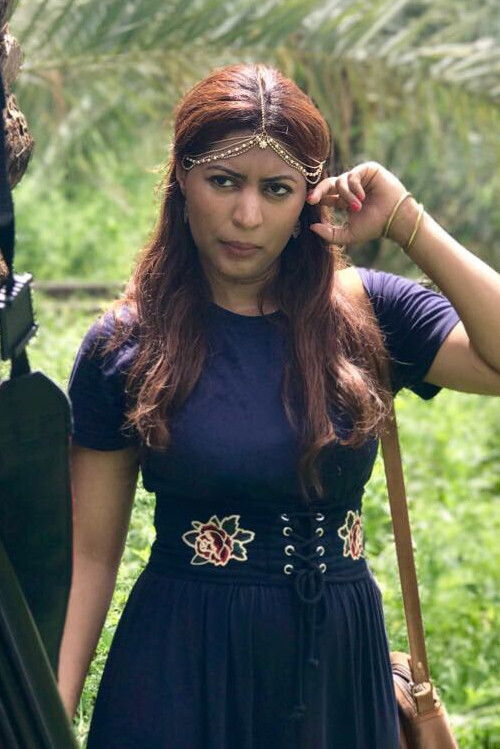 Muzna Almusafer backdrop