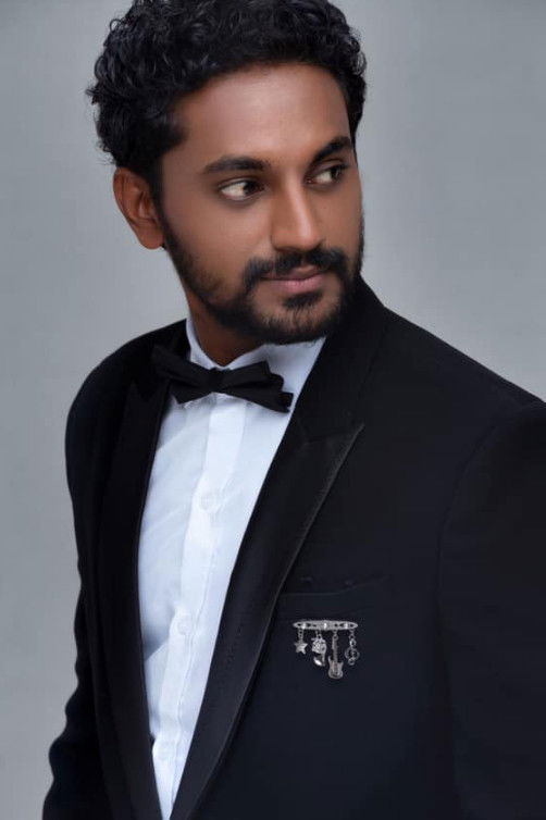 Sajitha Anuththara Anthony backdrop