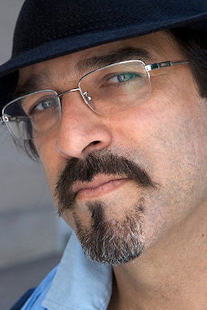 Atiq Rahimi backdrop