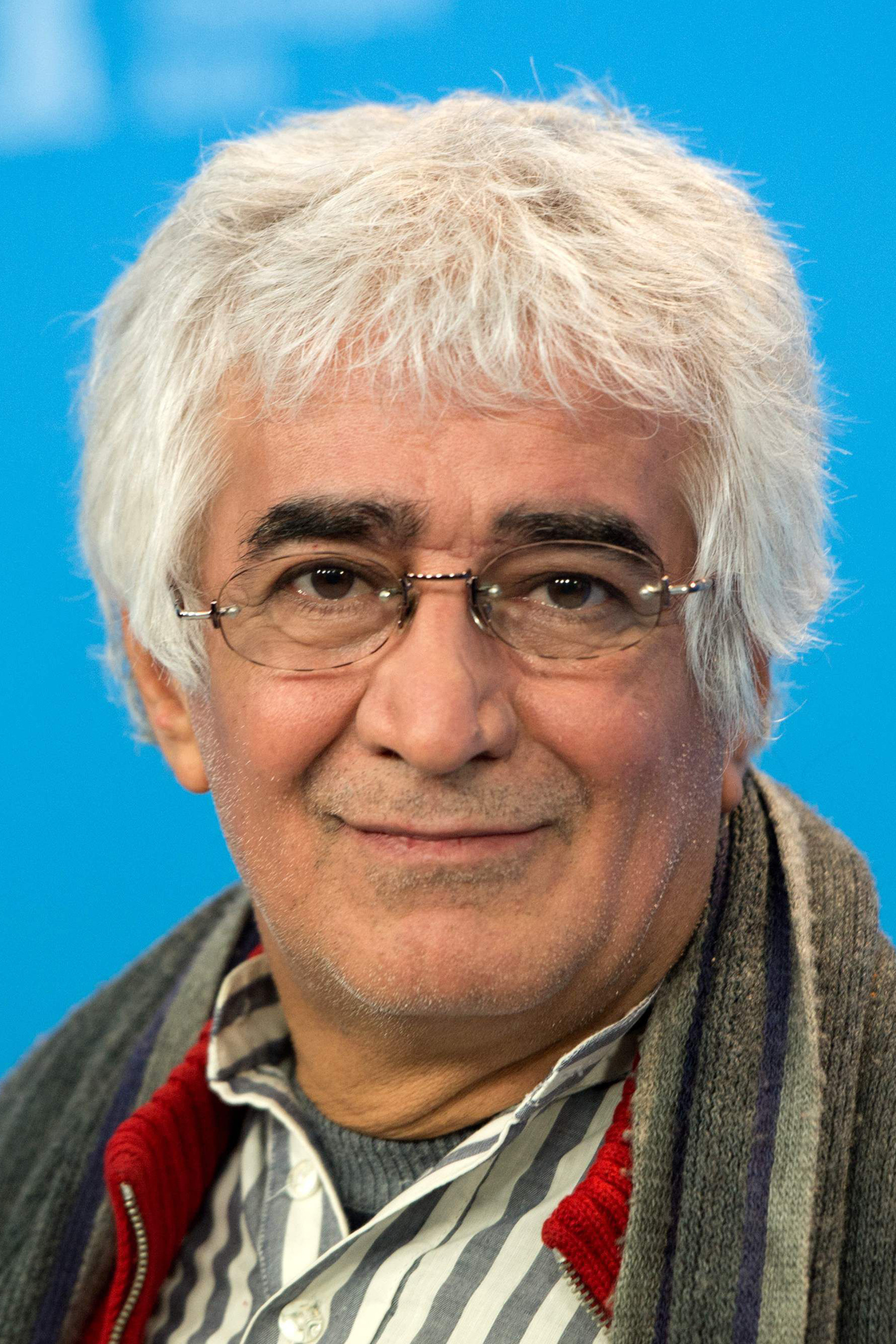 Kambuzia Partovi backdrop