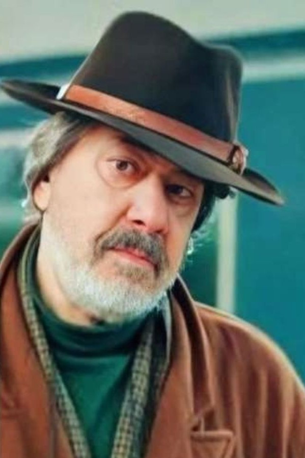 Manouchehr Sadeghpoor backdrop