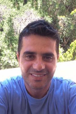 Manolis Hourdakis backdrop