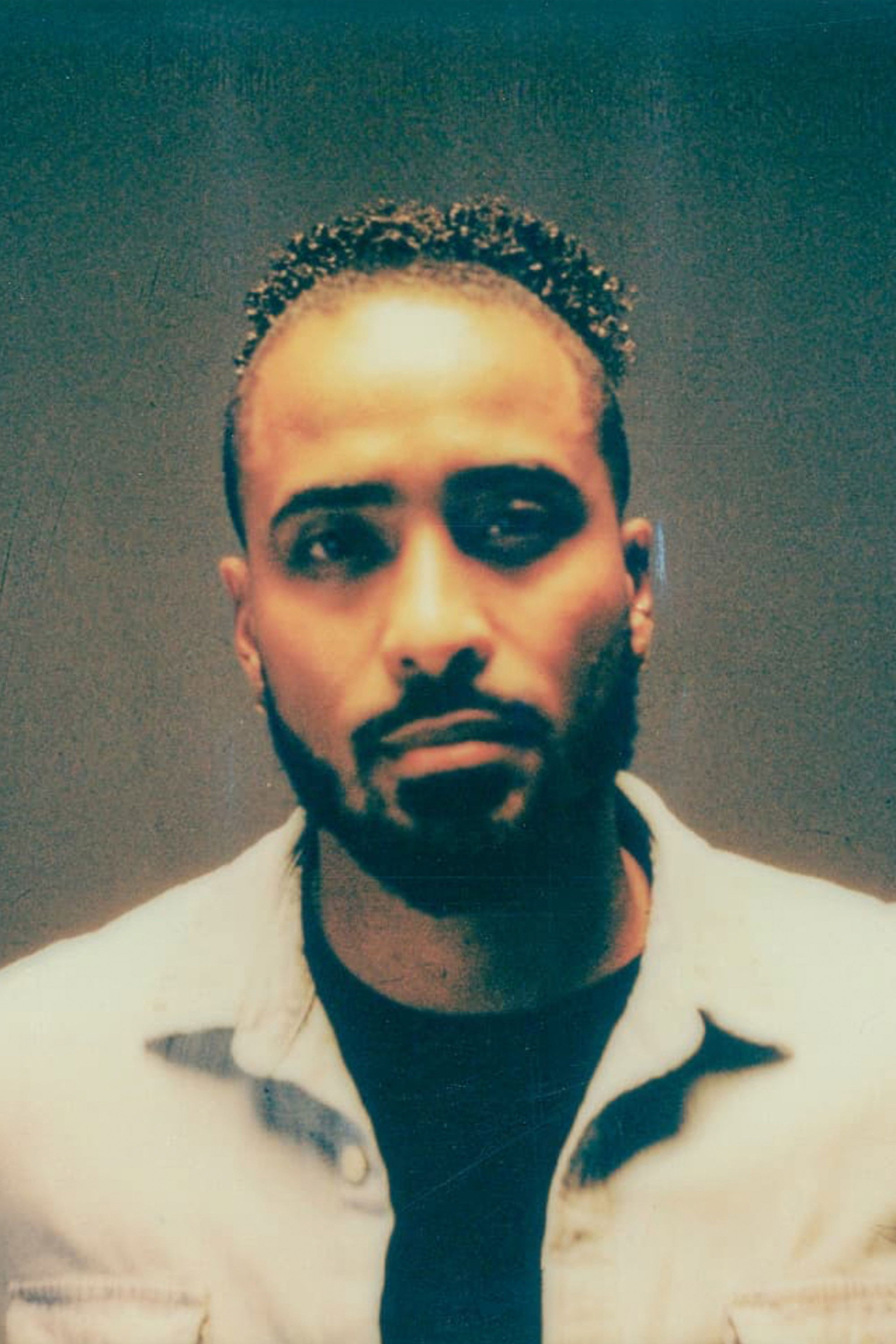 Reggie P. Louis backdrop