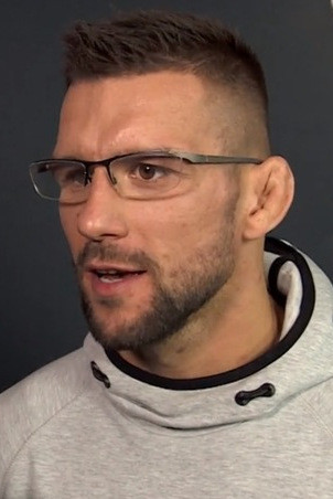 Mateusz Gamrot backdrop