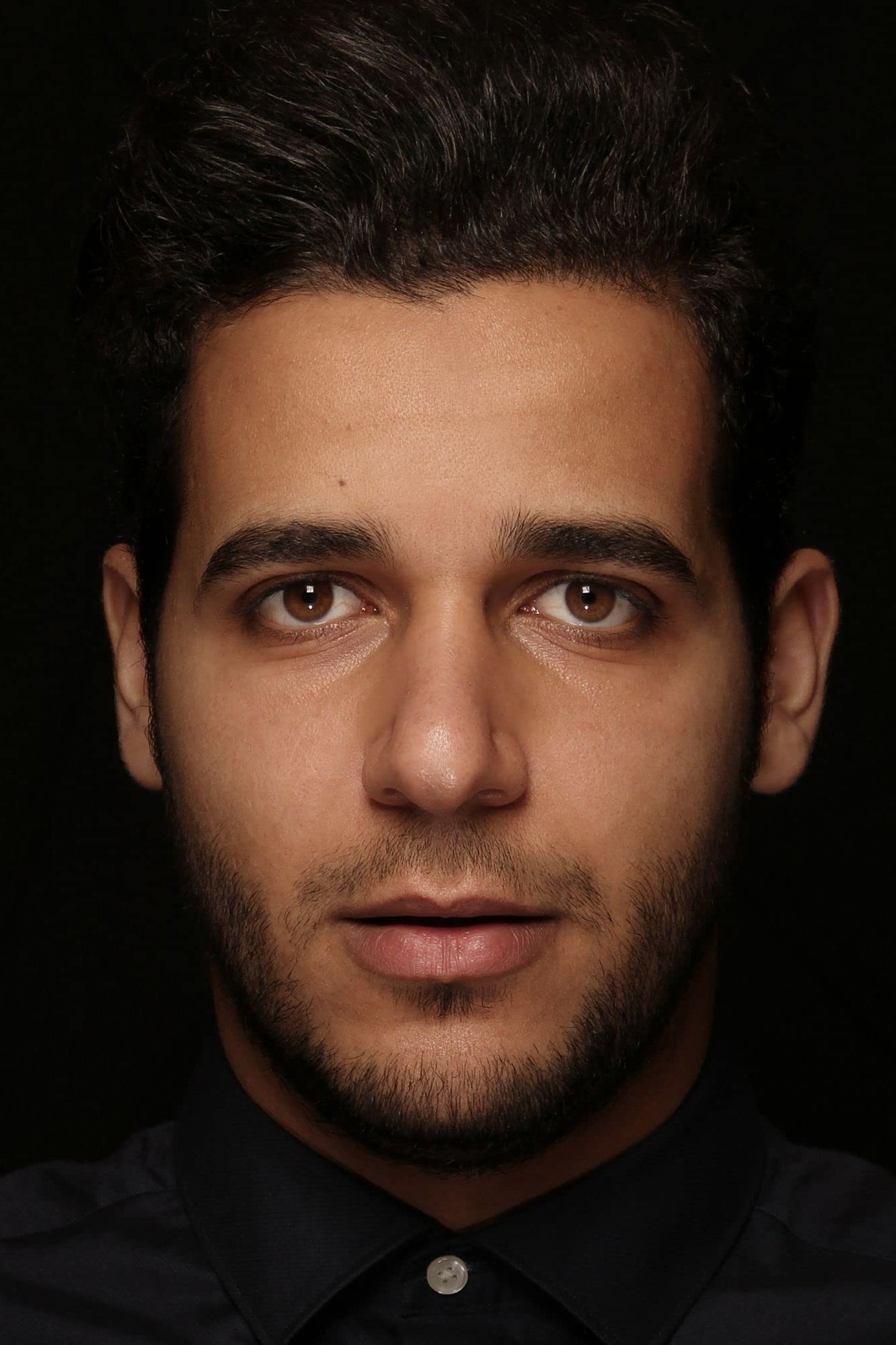 Islam Meligi backdrop