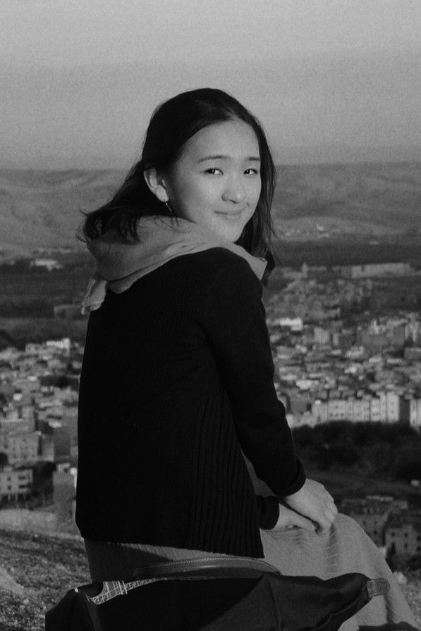 Niuyue Kay Zhang backdrop