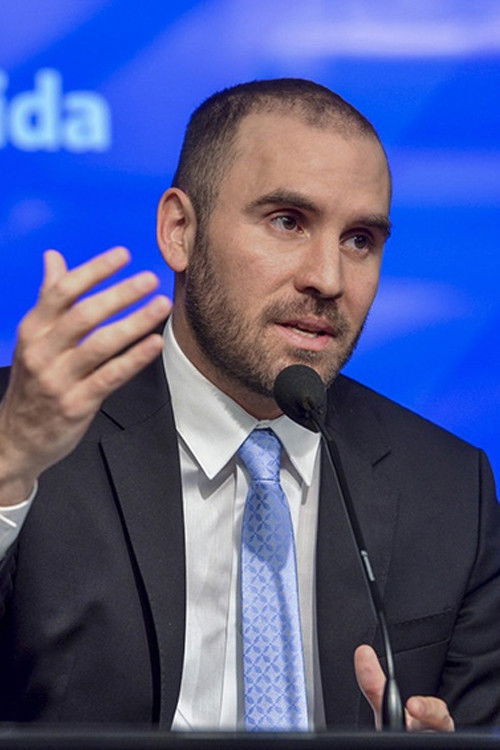 Martin Guzmán backdrop