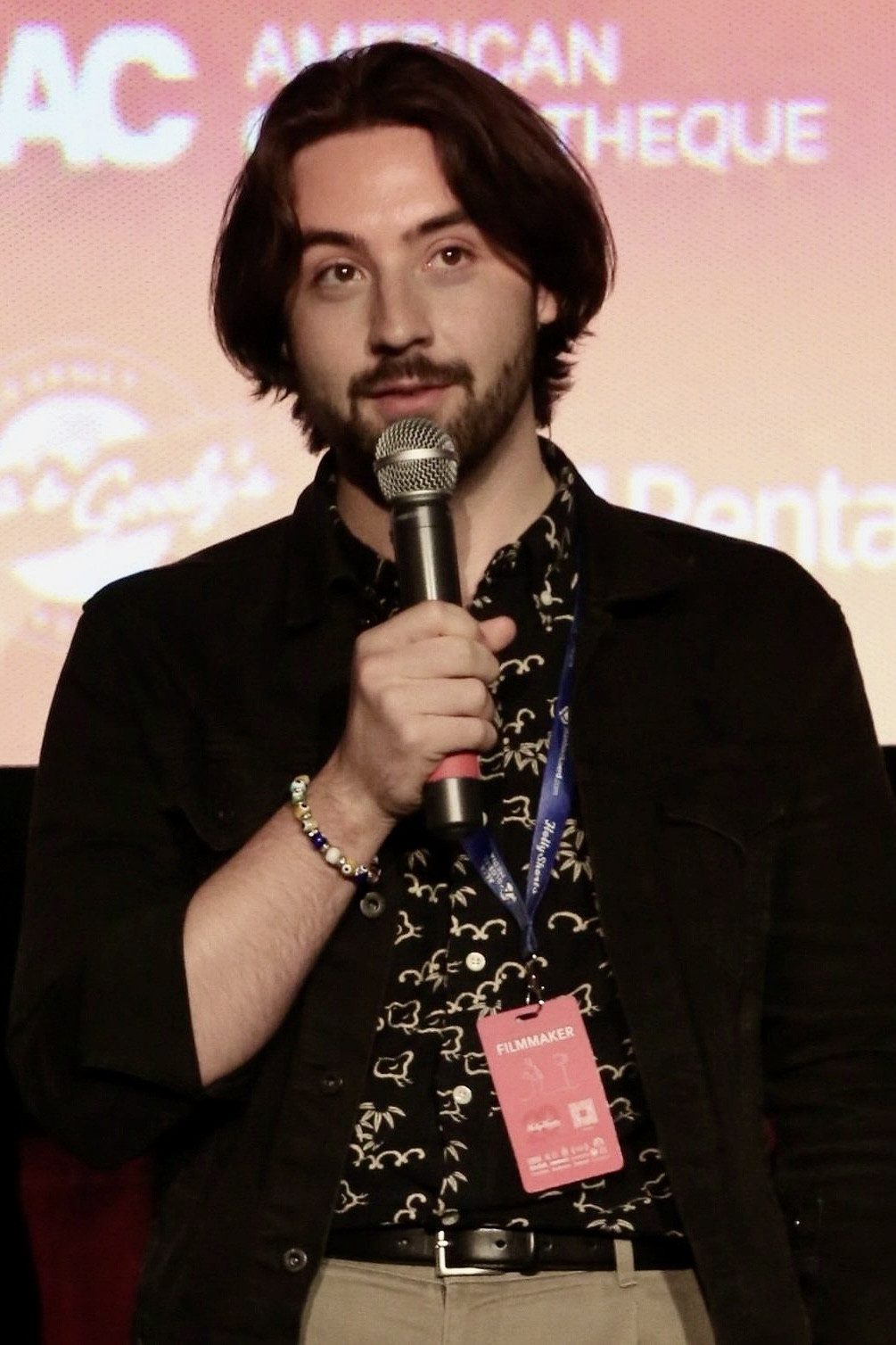 Adam Conversano backdrop