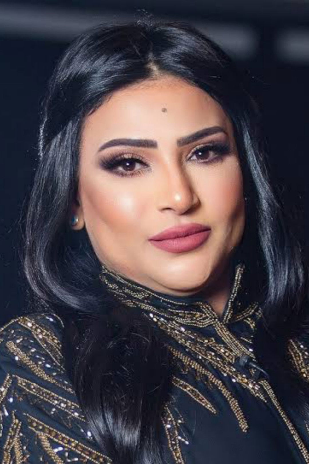 Badria Tolba backdrop