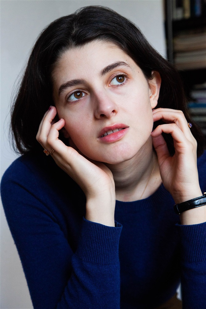 Mélodie Adda backdrop