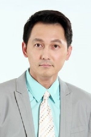 Trakarn Punthumlerdrujee backdrop