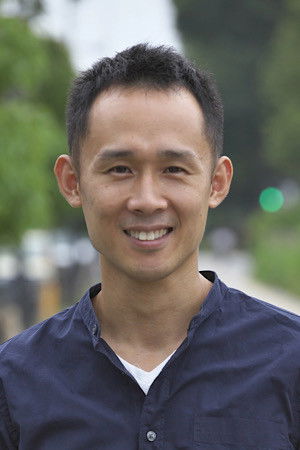 Masahiko Aoki backdrop