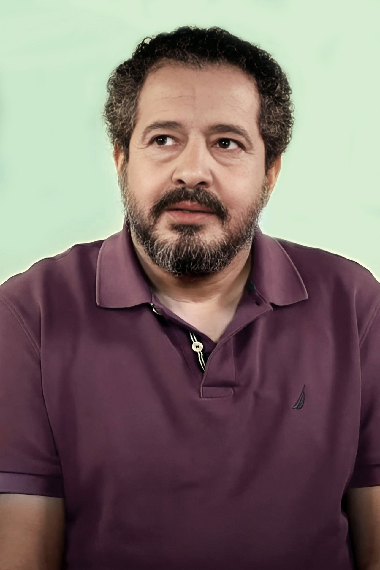 Kamel Rouini backdrop