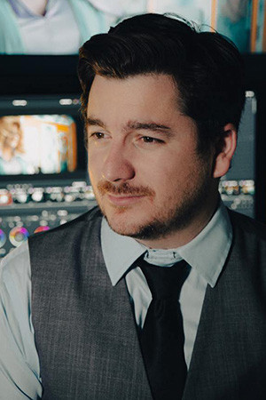 Kyle B. Thompson backdrop