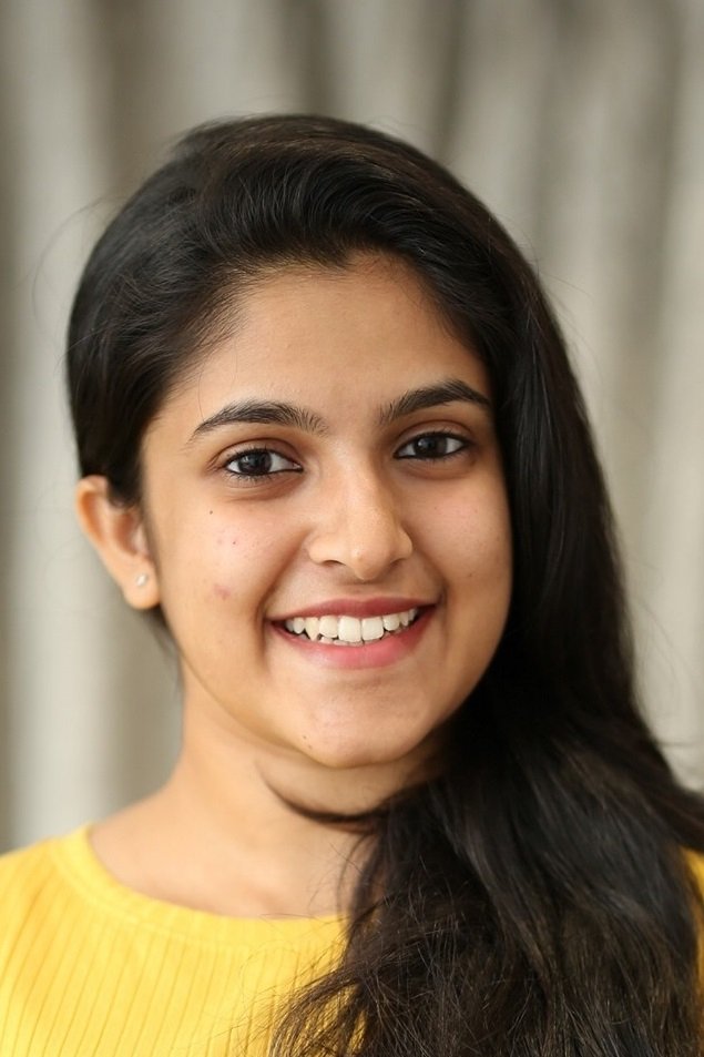 Meenakshi Dinesh backdrop