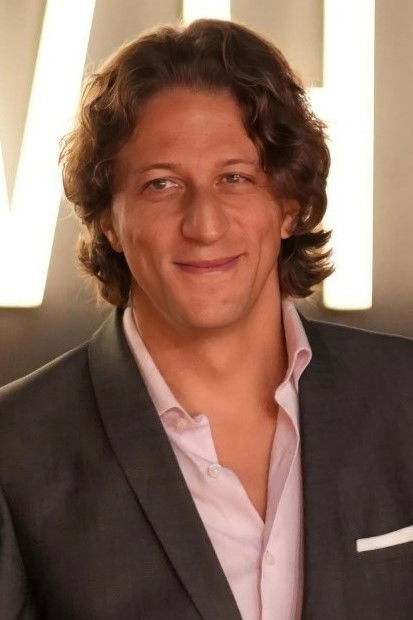 Chakib Taleb-Bendiab backdrop