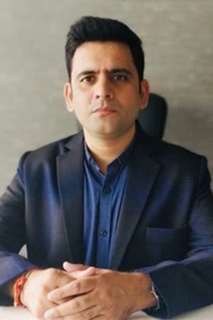 Ashok H Choudhury backdrop