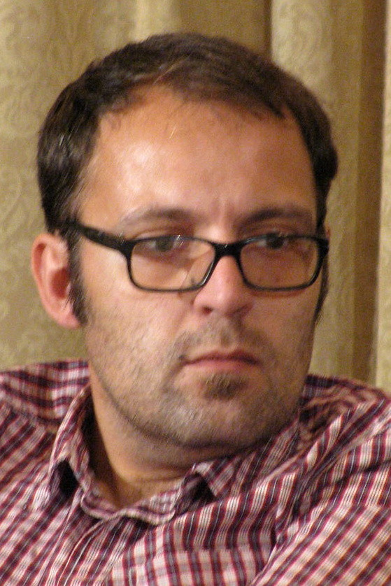 Avgoustos Korto backdrop