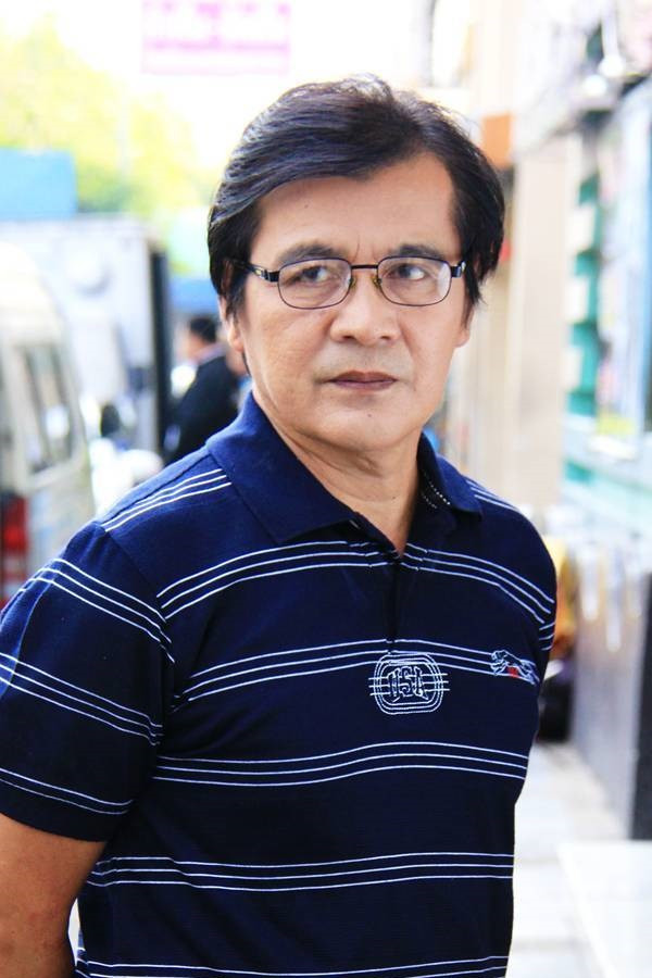 Wanchai Paowiboon backdrop