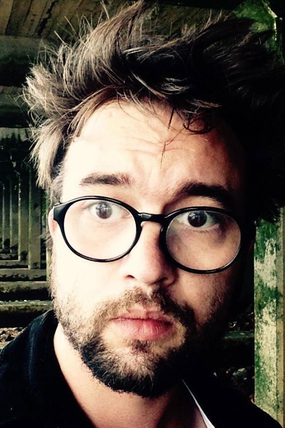 Benjamin Tzafetás backdrop