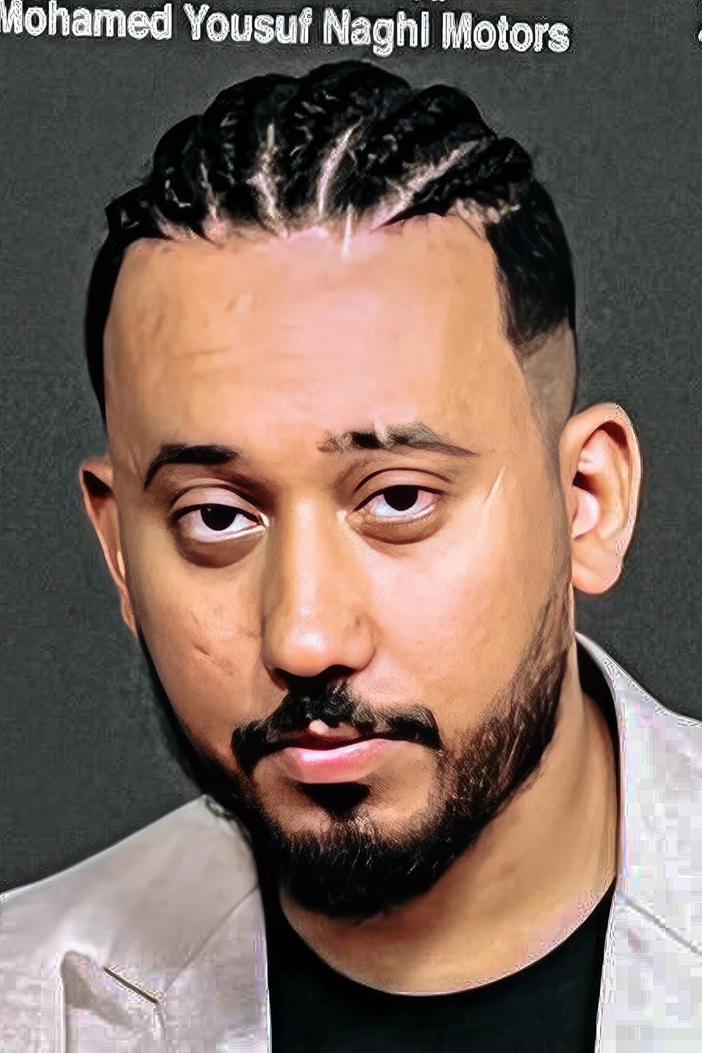 Ahmed Saddam backdrop