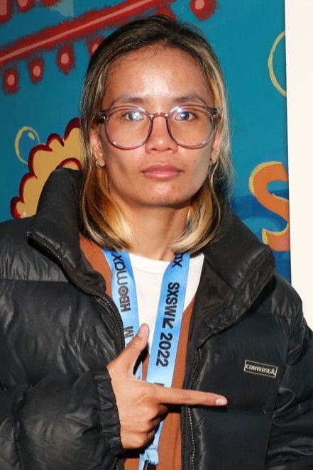 Kouv ‘Tin’ Chansangva backdrop