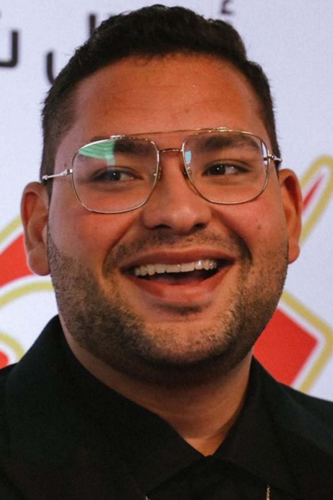 Mohamed Moula backdrop