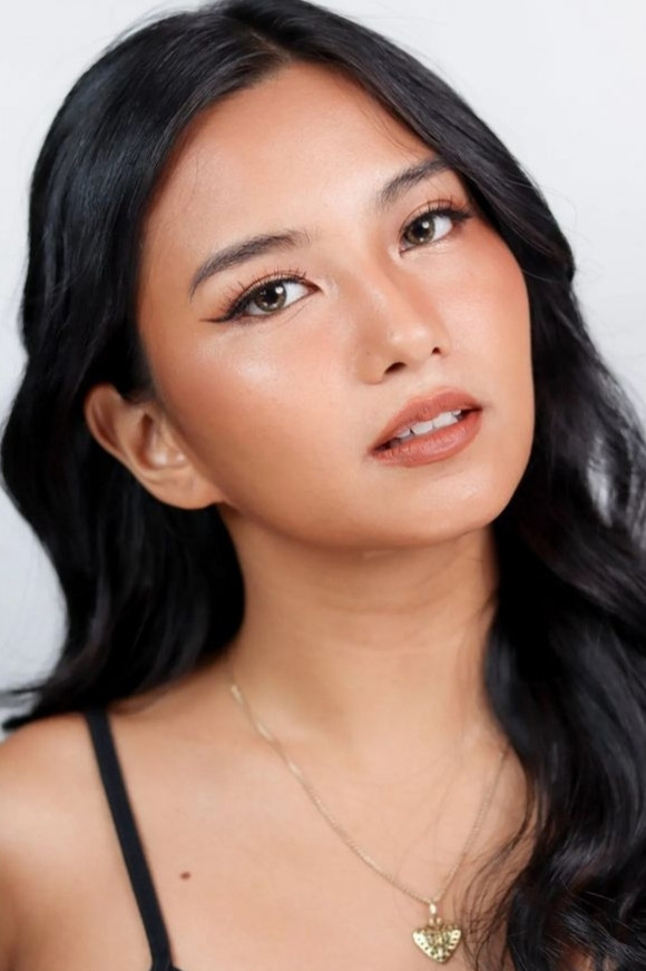 Krissha Viaje backdrop