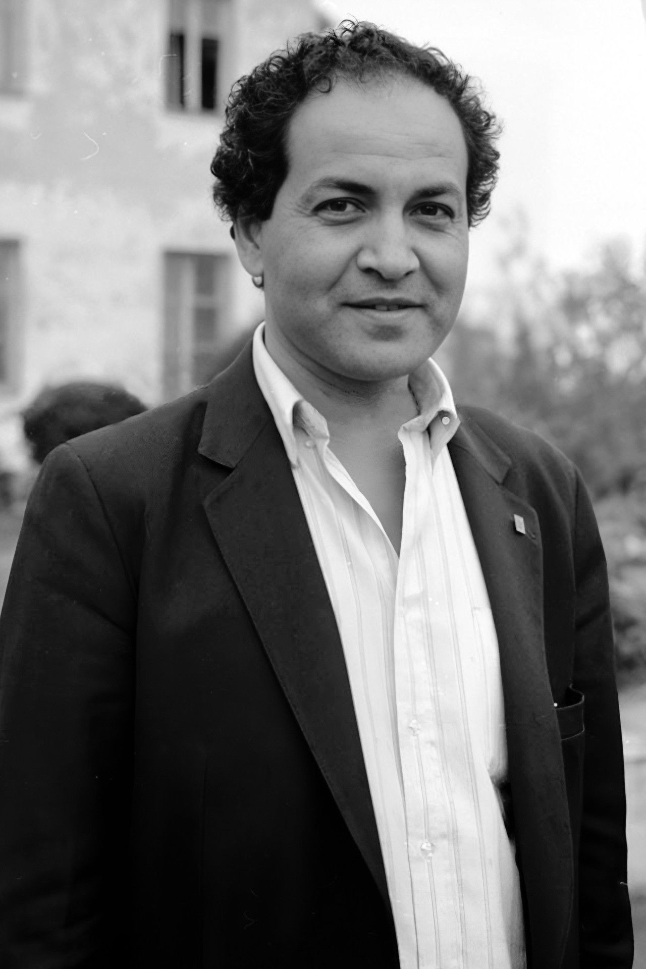 Mustapha Mangouchi backdrop